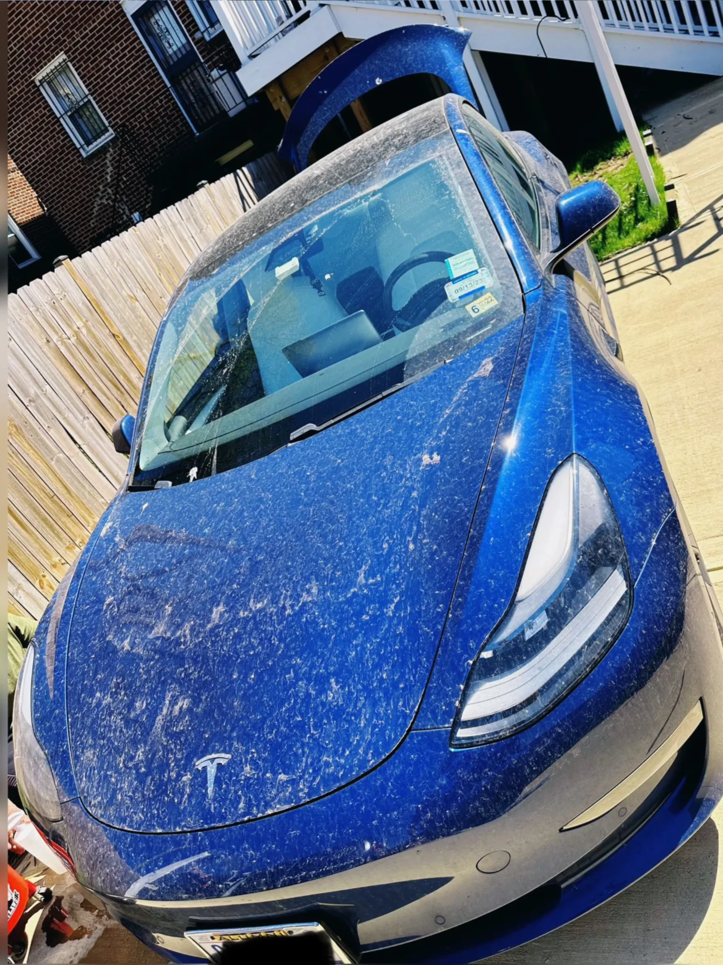 Blue Tesla before detailing